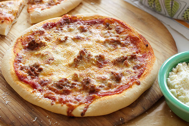 Pizza Personal de 4 porciones de un ingrediente. Carne